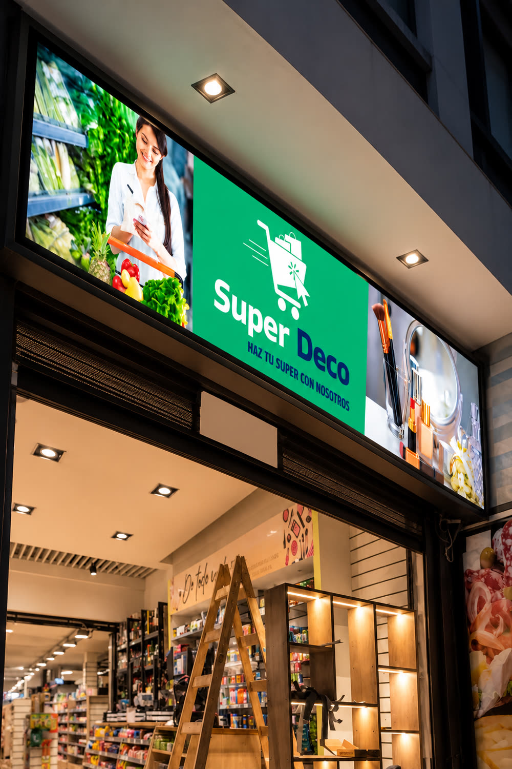 Lona y vinilos renovados en la fachada de Super Deco